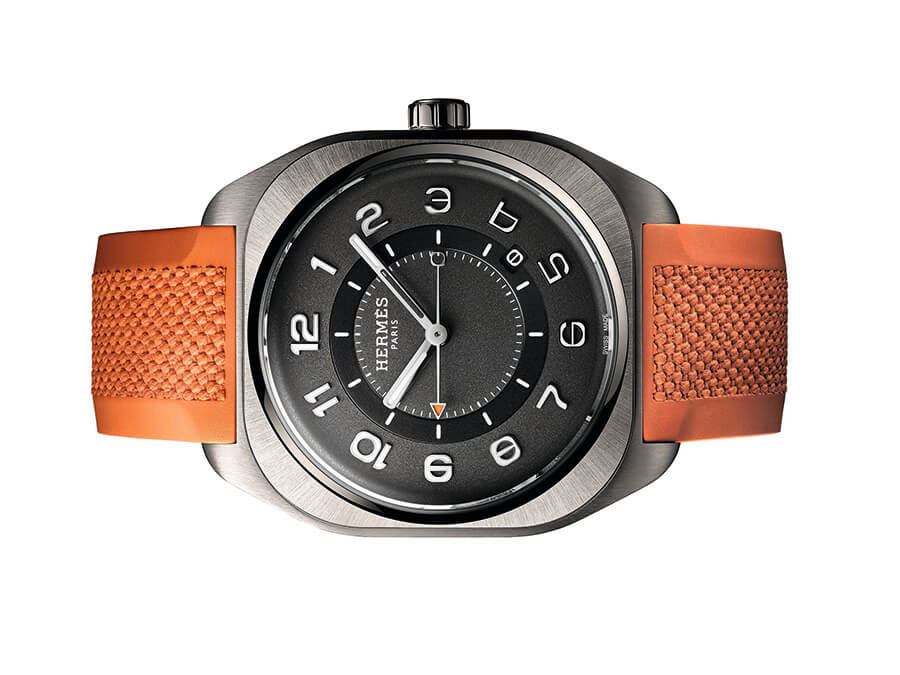 Nouvelle montre Hermès H08 avec son bracelet traditionnel orange signature de la marque (c) Joel Von Allmen